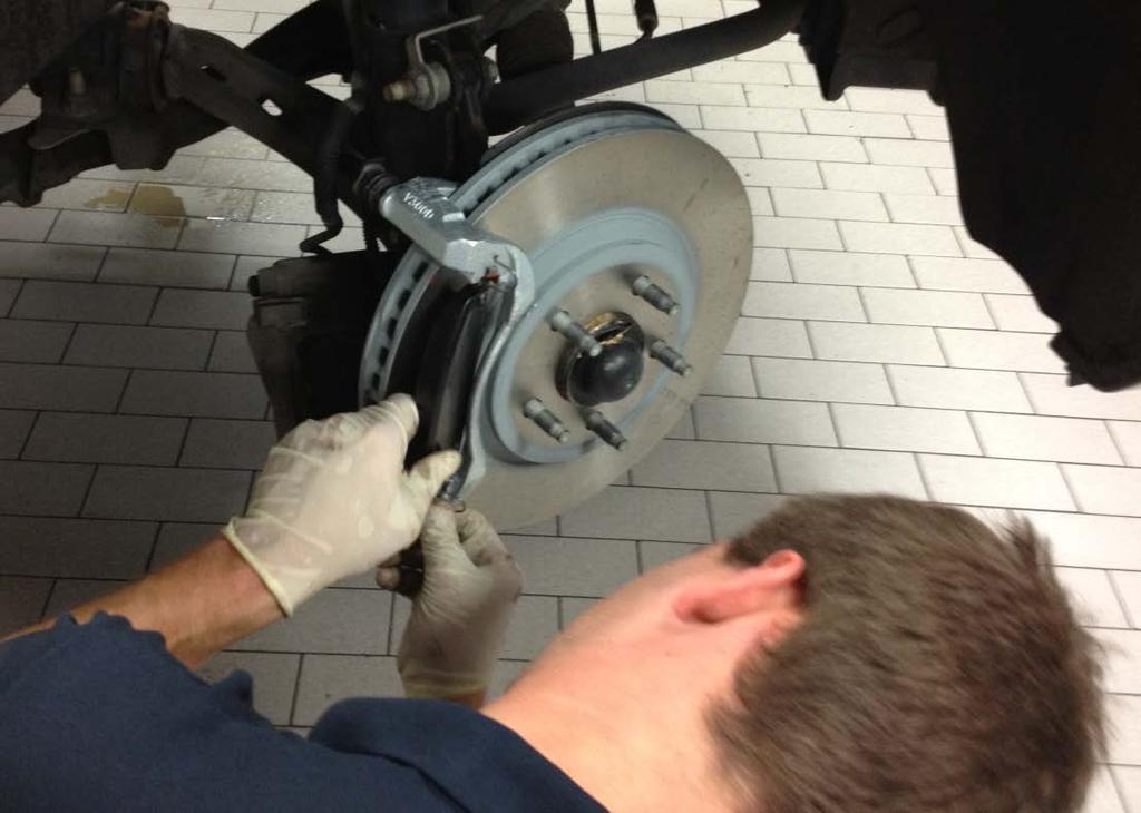 12. Install new Brake Pads in the caliper brackets. Once again both sides.