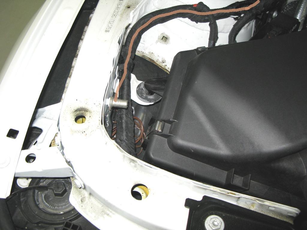 Connect the power wire to the positive battery lug in the same compartment where the Dinan ECU is located. Coil the excess wire and secure with a zip tie. 17.