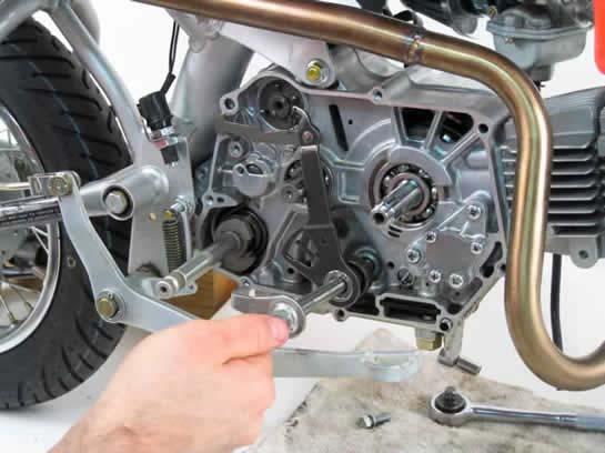C10. Carefully remove the gearshift spindle
