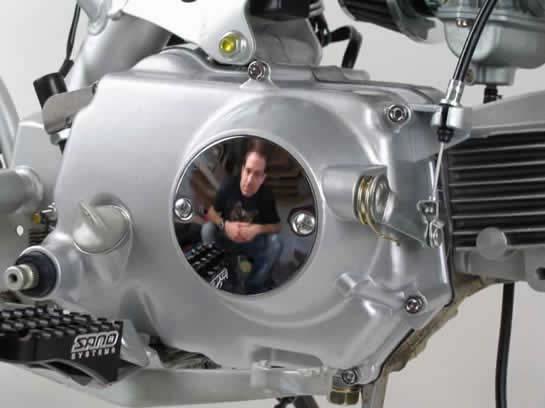 C30. Install the chrome clutch cover and use your shirt to polish it to a mirror like finish.