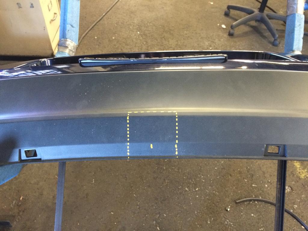 Step 10. Mark and trim a 3-1/4 x3 for 1.25 receivers and 4-1/4 x3 for 2 receivers, section from the center of the bumper.