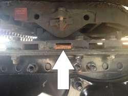 Sliding Fifth Wheel Locking Pin- Properly Mounted and Secure. Not Cracked, Bent, or Broken.
