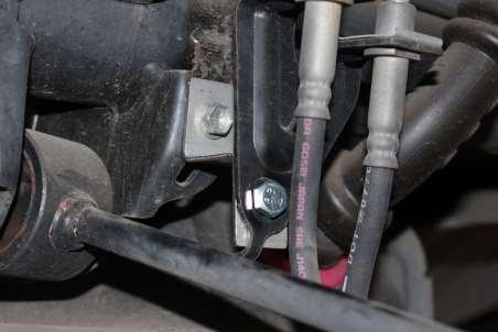 socket. (See Figure 15). 16. Re-install the rear sway bar hardware.