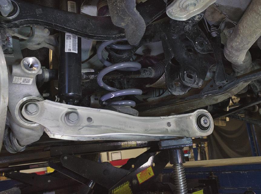 Use 12-point wrenches or sockets on the control arm and toe link bolts. 4.