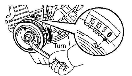 Connect the timing belt to the camshaft timing pulley, and checking the tension between