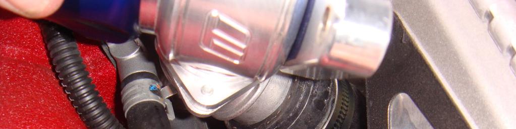 6. Push the plumb back side of the Turbosmart BOV onto the standard return pipe and secure the