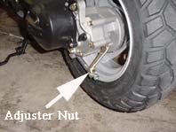 16) Tighten carburetor bowl drain bolt. 17) Check rear brake adjustment.