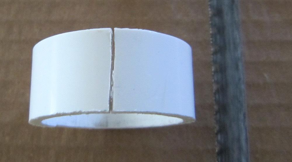 Cut across the PVC slice at one of the markings so it will open up