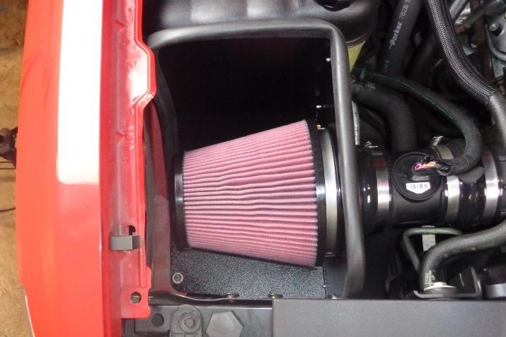 .install the engine cover by aligning it with its