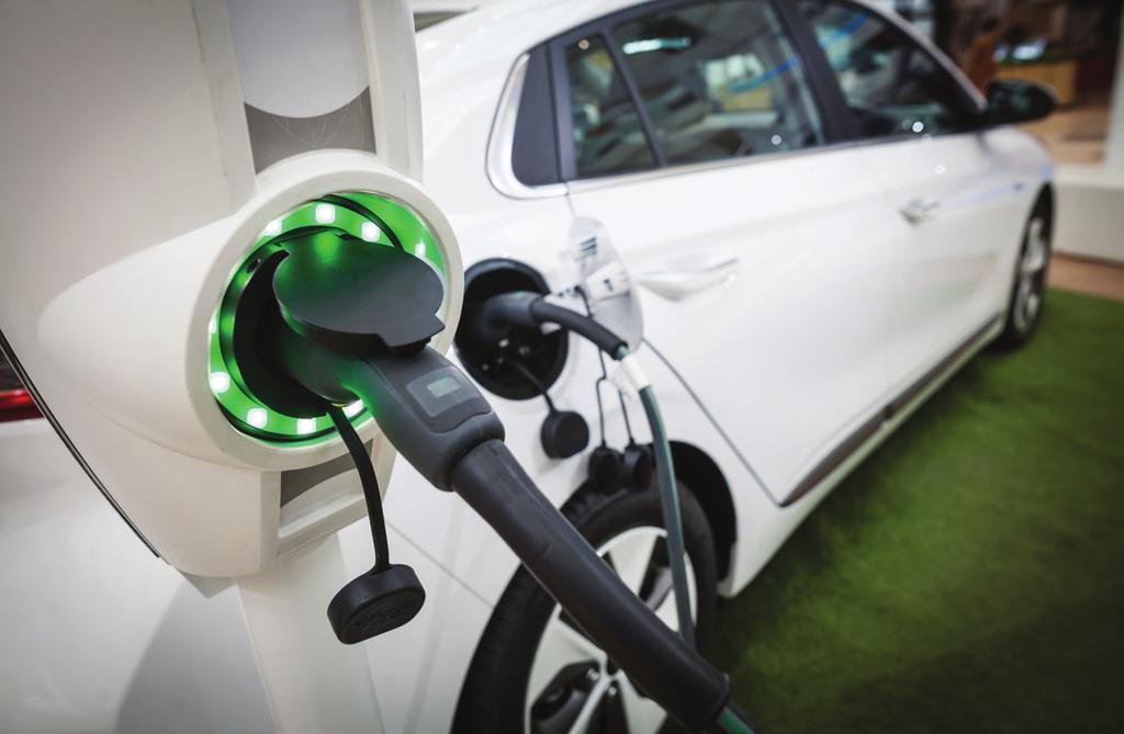ROAD SIGNS Will More Charging Stations Accelerate EV Sales?