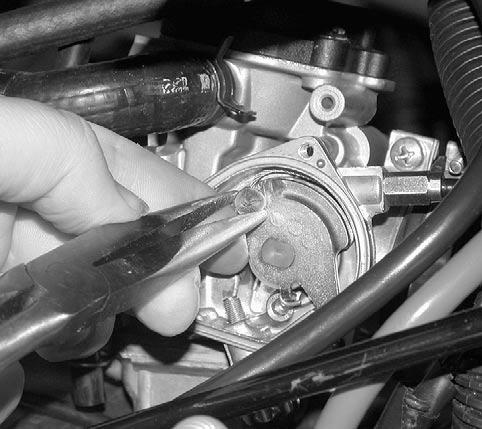 Callout V07F0AA V07F09A THROTTLE CABLE Removal Carburetor Side WARNING Ensure the key is turned OFF, prior to performing the throttle