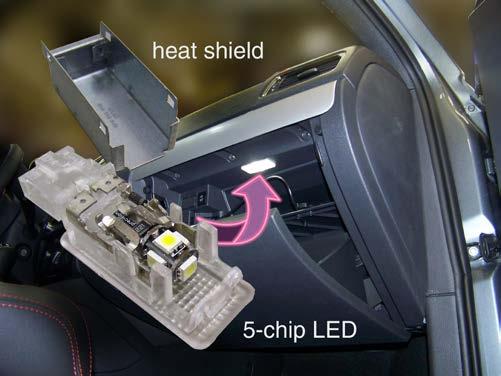 Note that the light has a metal heat shield covering the bulb holder.
