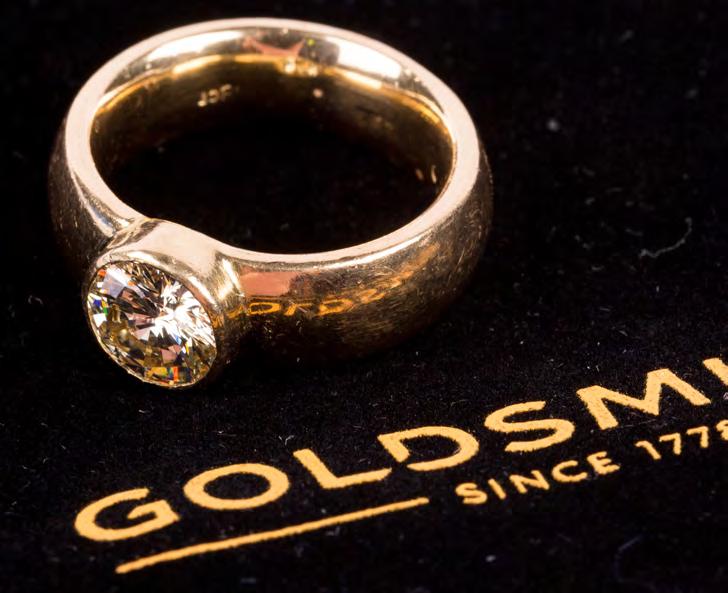 LOT NUMBER: 68 18ct Gold and Diamond Ring Size: R 1/2 Approx. Ring Weight: 19.16 Grams Approx.