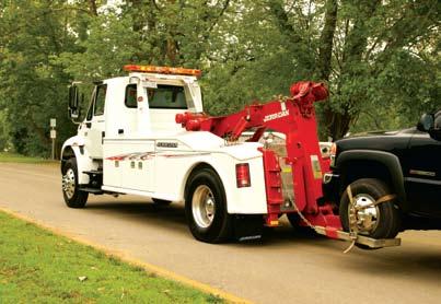 Each medium-duty wrecker from Jerr-Dan features dual 15,000 lb planetary winches, a fold-up underlift and a double-door crossover tool compartment for easier storage.