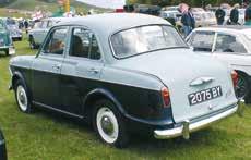 wood-trimmed fascia and door cappings, two gloveboxes, leather seats, adjustable individual front bucket seats, two sun visors,