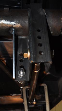 They should be straight up and down when viewed from the side, and angled when looking at them from the front or rear. When satisfied, tack weld the brackets into place.