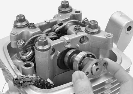 Remove the camshaft from the camshaft holder. INSPECTION Turn the outer race of each camshaft bearing with your finger. The bearings should turn smoothly and quietly.