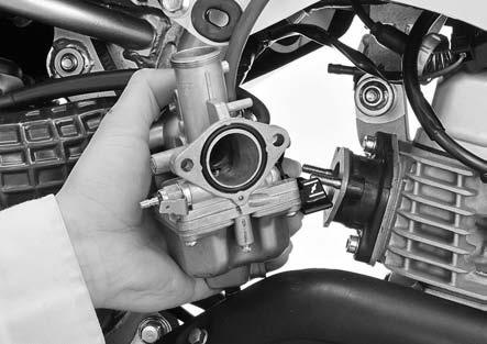 Installation is in the reverse order of removal. Be sure that the diaphragm and O-ring do not interfere with the cover. TORQUE: 2.1 N m (0.2 kgf m, 1.