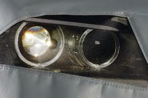 maintenance. With coated mesh fabric covering the headlamps. Non-scratch attachment without magnets. Made of strong foam-coated artificial leather, grey.