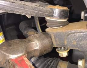 STEP : Disconnect sway bar links at the control arm.