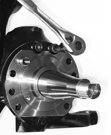 5. Fill wheel end assembly through the center fill port with the Grade 2 oil (SAE-80W-90, GL 5). Allow the oil to seep through the outer bearing and fill the hub cavity.