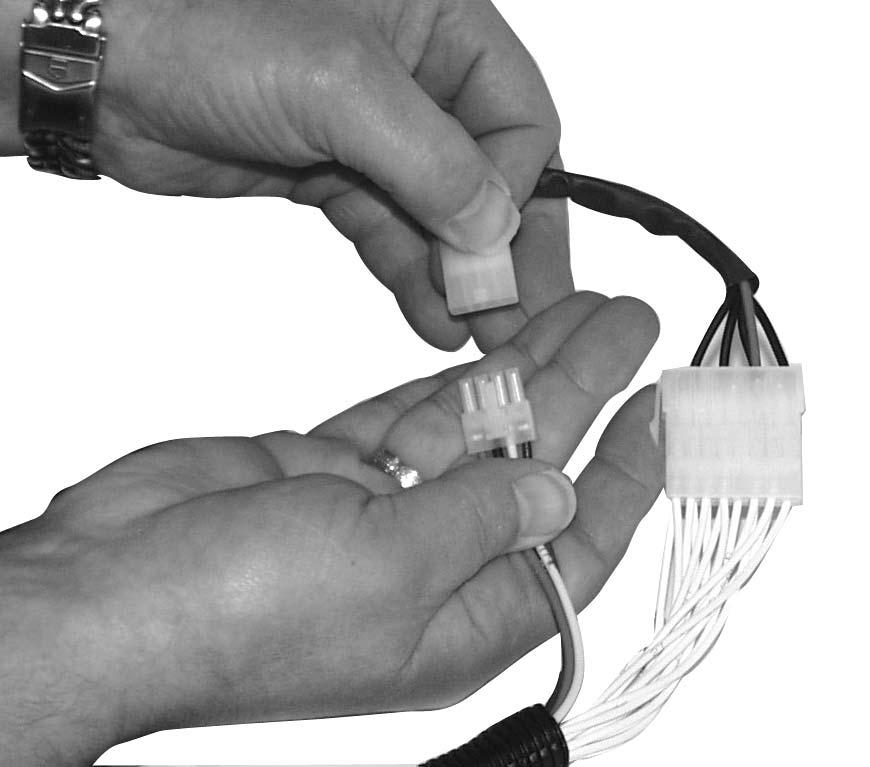 Plug the large connector of the jumper assembly into the wire harness (Figure 3.) 4. Plug the 4-way connector into the wire harness.