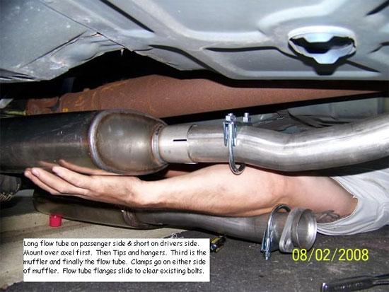 13. Slide another clamp onto the flow tube and slide it into the muffler.