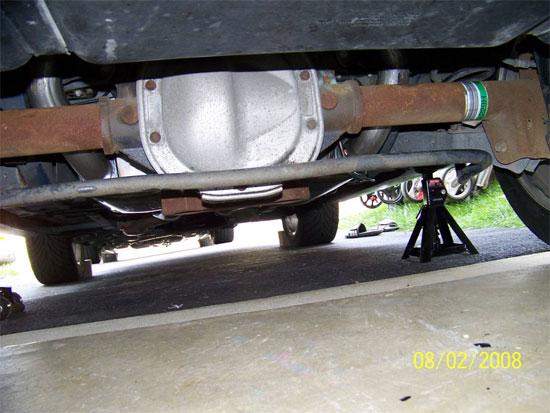 18. Once everything is loosely in place go ahead and tighten all connections. Have a friend hold the exhaust system up while you tighten it down. Make it TIGHT.