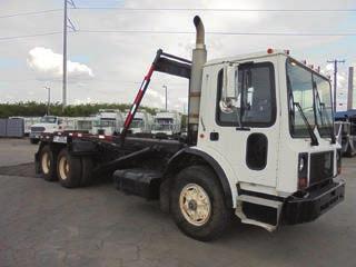 USED ROLL-OFF TRUCKS nap In Stock Now!