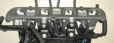 Place the VSI couplings with a lock compound in the inlet manifold.