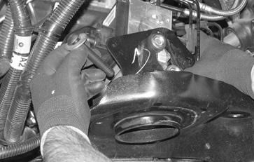 in the coil bucket. SEE FIGURES 3-4 2. DRIVER SIDE ONLY - Starting on the driver side, remove the driver side fender liner. 3. Remove the factory shocks and discard.