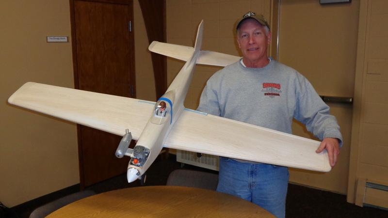 This plane was a Great Planes ARF and was done in red and white Monokote. It had a 60-inch wingspan and weighed in at 6.5 pounds.