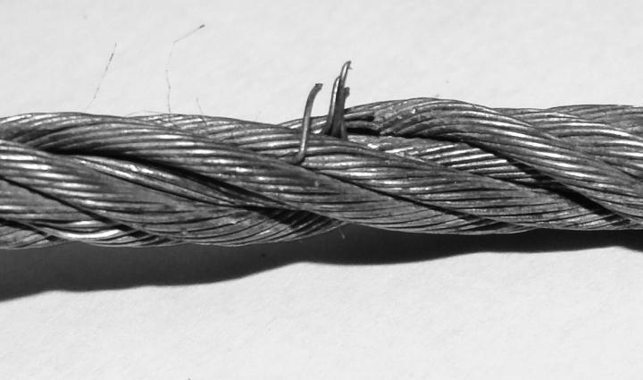Cable deficiencies of this type are usually caused by abrasion. This can easily happen in a hoist operation if the operator allows the cable to come in contact with any other surface.