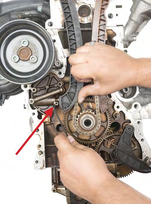 - 8-7. Loosen the timing chain. Use your finger to press the tensioner blade against the clamping element (Fig.