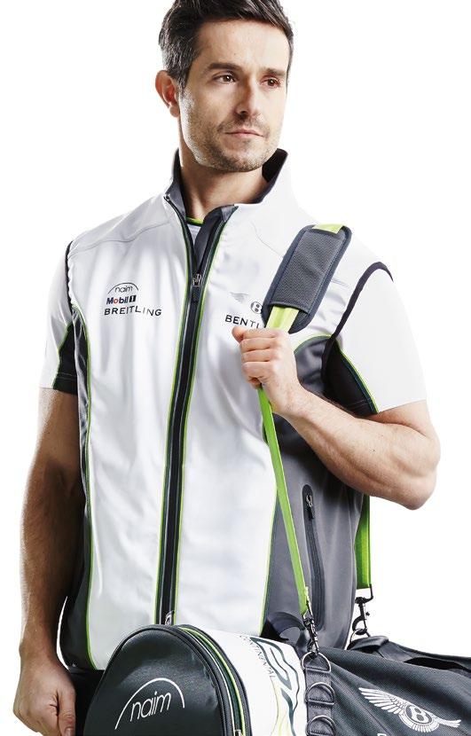SOFTSHELL VEST Dark Grey side panels and decorative Green tape. Glued zipped pockets. Union Flag. BENTLEY wings and main sponsor logos. High collar.