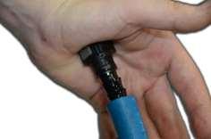 Take the fuel line end and lubricate the barbed end with clean motor oil (Figure 5) and press it into the fuel line (HS14) until all three barbs are covered (Figures 6 and