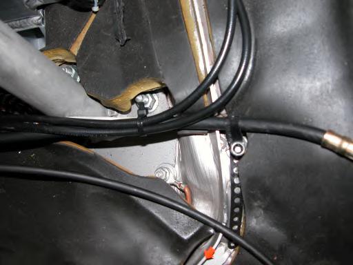 5. Remove the rear deck actuator black connector from the control module by squeezing the side tabs and pulling the connector downward. See Fig. 6.