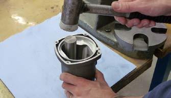 Grease the ball bearing hole with