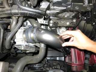 Install the hump hose(aem-5-575) onto the throttle along with two hose