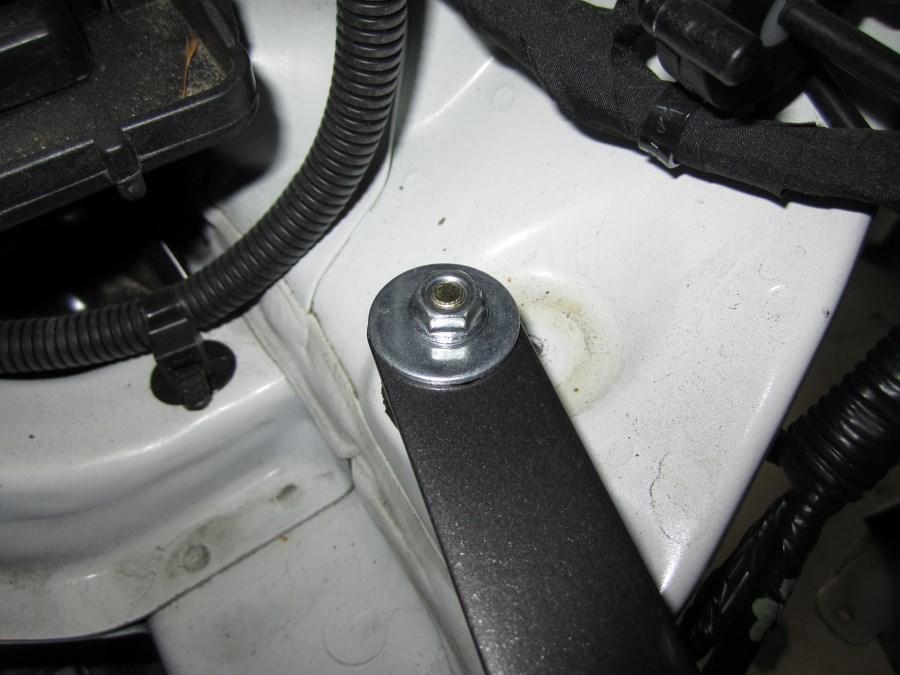 E. Loosely install the flat washer (C) and M6 flanged hex nut (D) over the M6