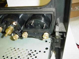Install radio into the bottom slot of the bezel until the clips are secure as shown in Photo 1-A. 2.