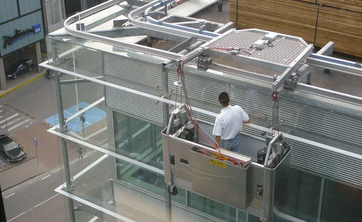 A BMU cradle is suspended from the jibs allowing an easy facade access for window cleaning and maintenance. The Roca roof trolley is the original roof trolley by Rostek.