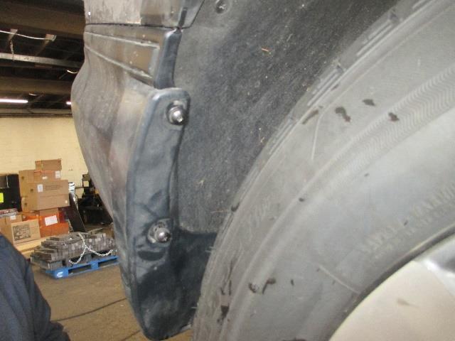 The second step is the removal of the mud flaps on driver and
