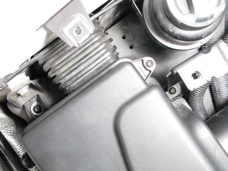 15. Unscrew the marked bolts on both sides of the air box and carefully remove the air box out of the engine compartment