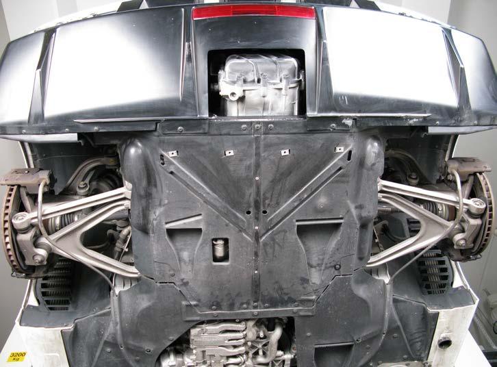 2. Unscrew the marked bolts and remove the rear sections of wheel arch panels off the vehicle (Figure 4).