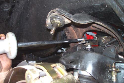 1. On some cars, to remove the upper control arm you must remove the bolts, which are pressed into the frame.