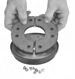 Remove the screws (item 8-5) which retain the friction disc
