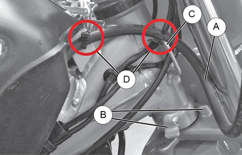 indicated in the image below R Feed the brake line forward under the bottom of the gas tank along the main frame of the motorcycle.