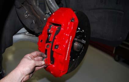 INSTALLING THE NEW FRONT BRAKES Step 7: Slide the outer brake pad into place in one of the