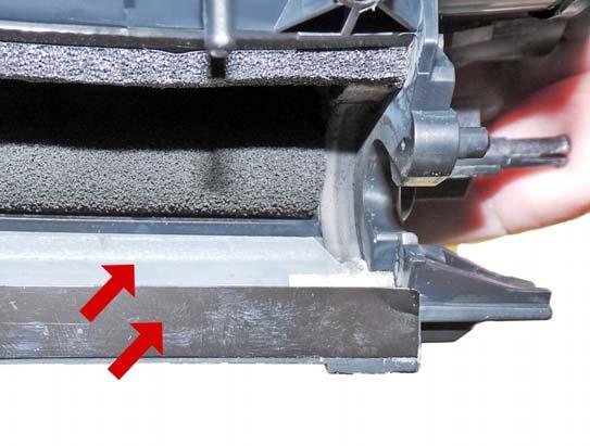 Remove the two outside doctor blade screws.